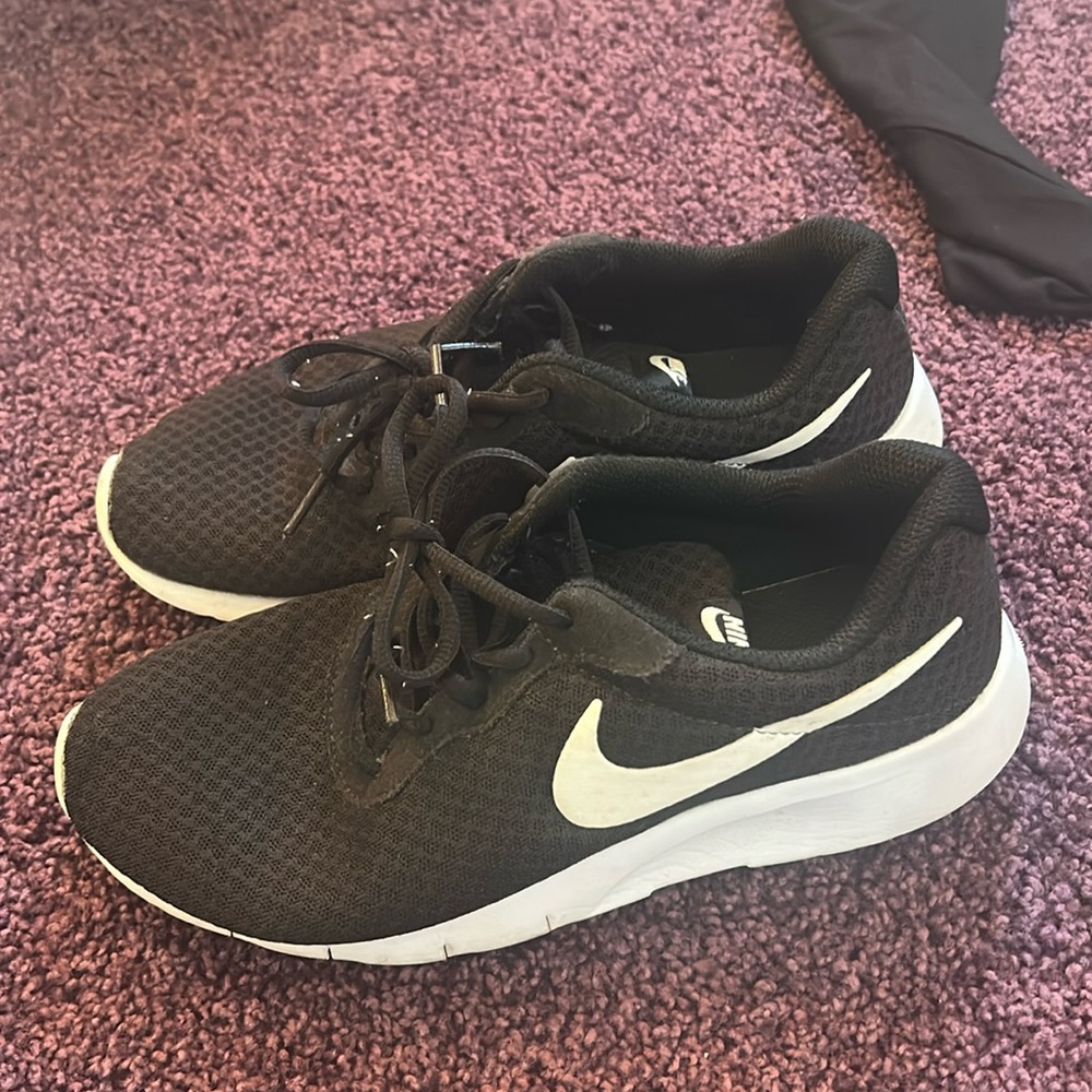 Black and white Nike running shoes